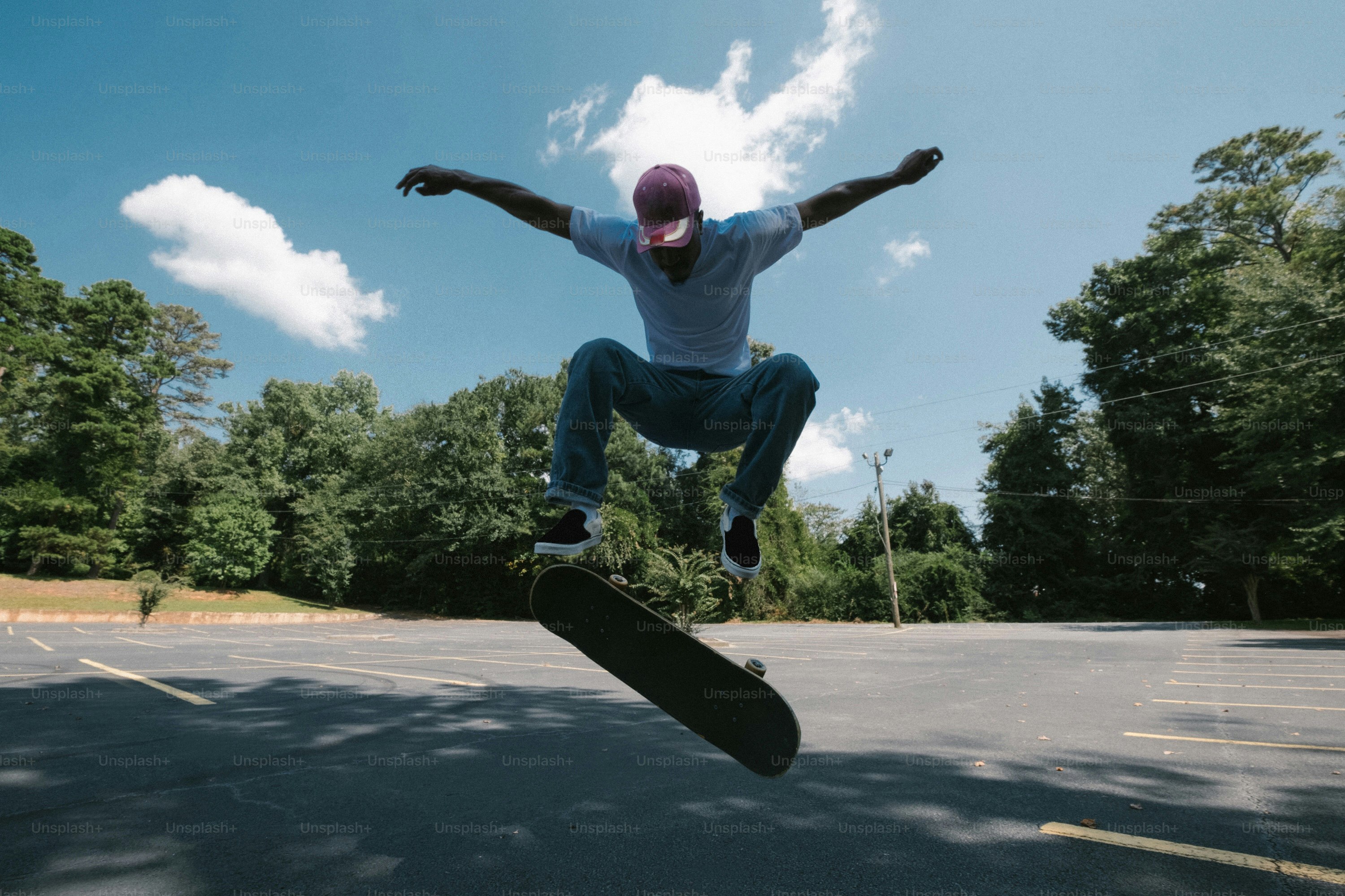 a person jumping a skate board in the air