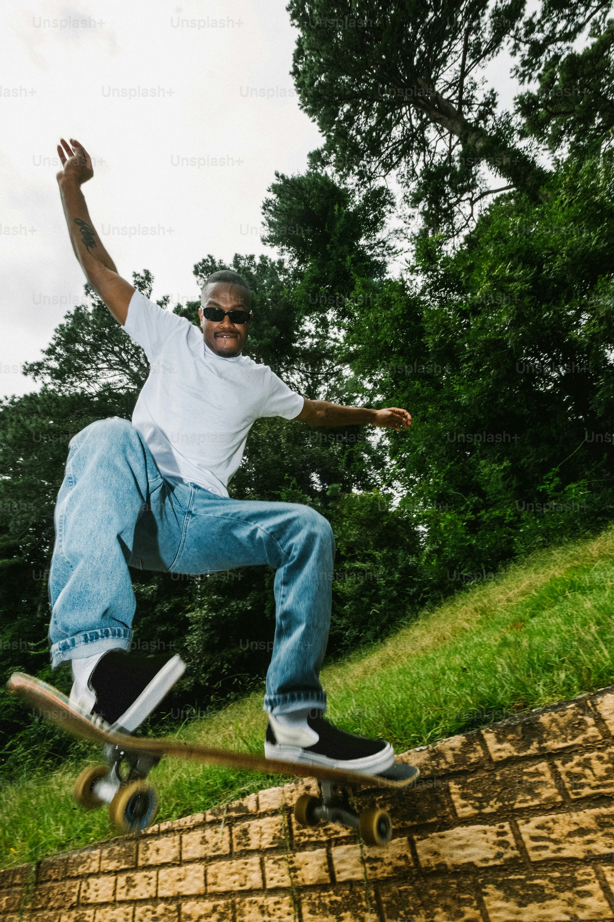 a man riding a skateboard up the side of a ramp