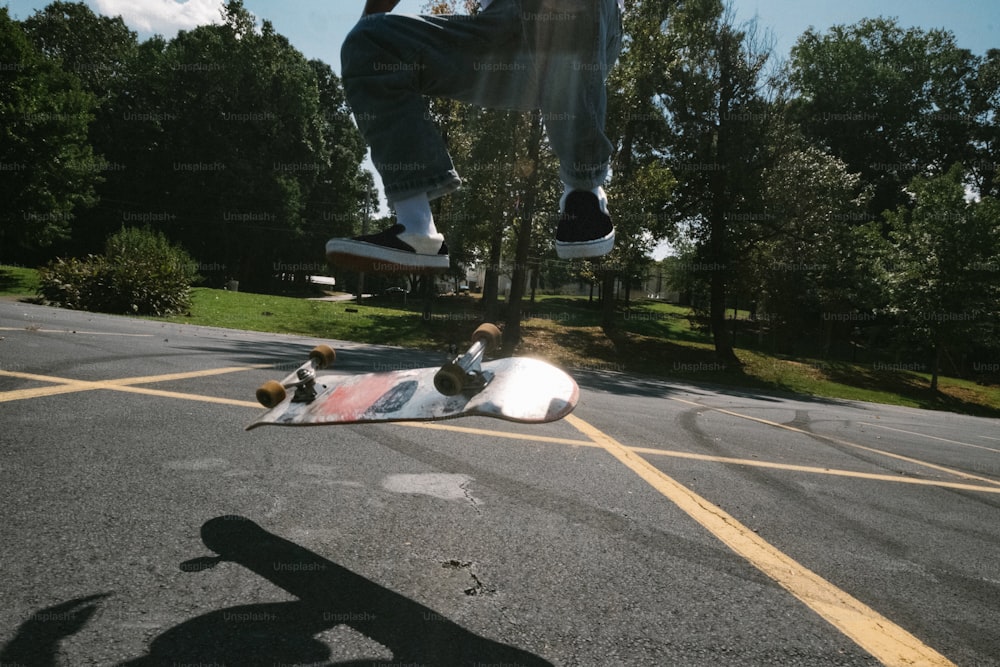 a person jumping a skate board in the air