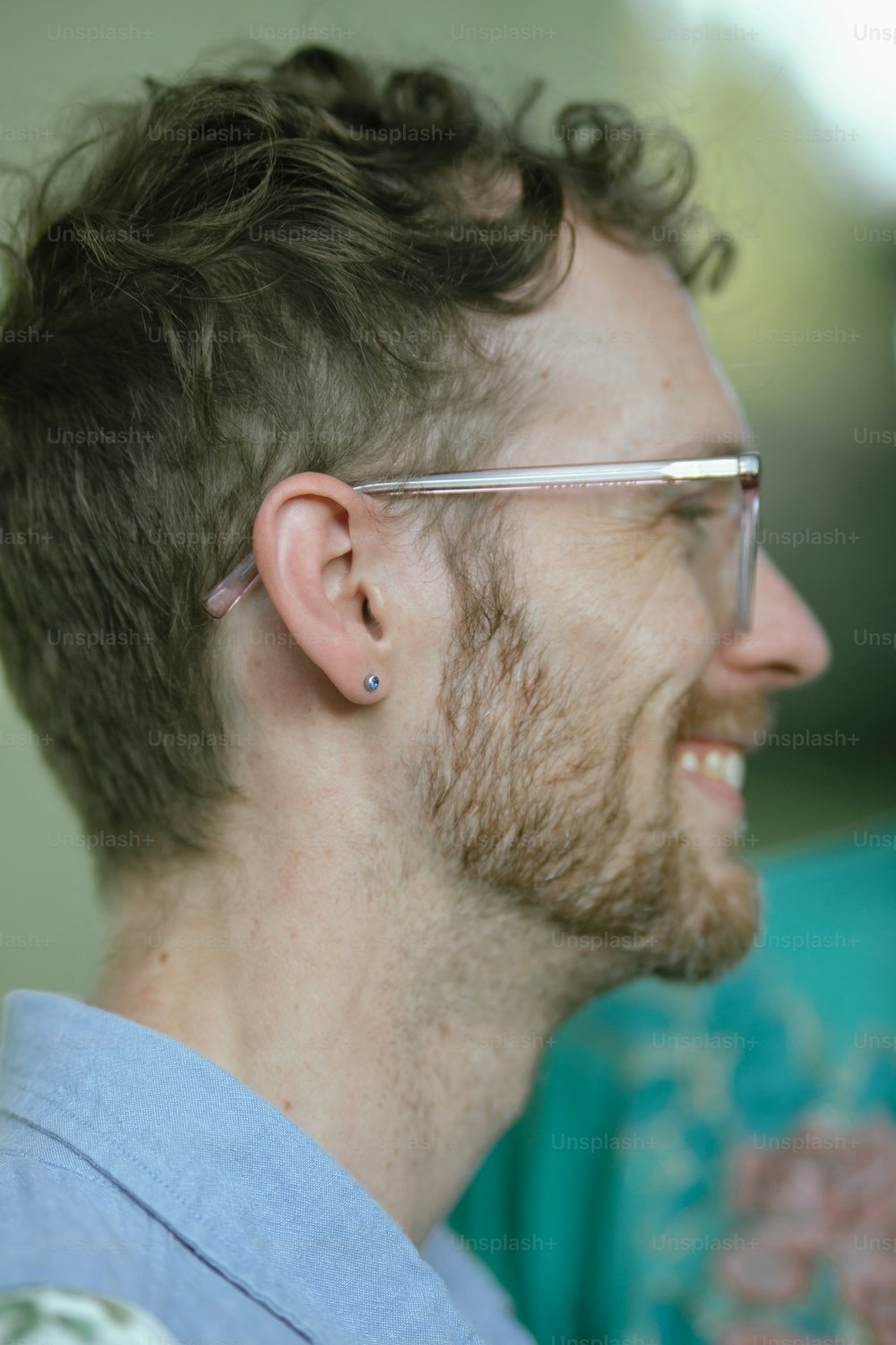 a close up of a person wearing a pair of glasses