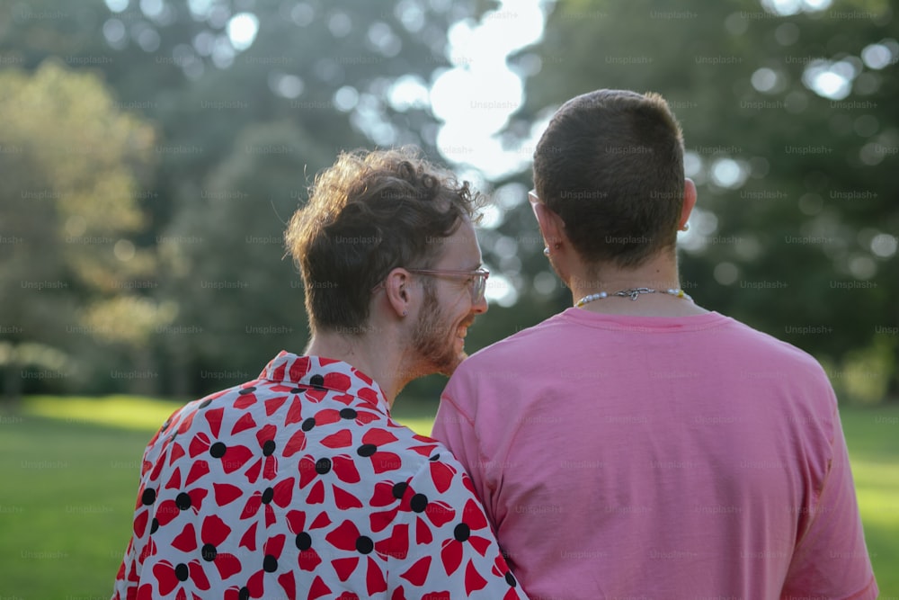 a couple of men standing next to each other