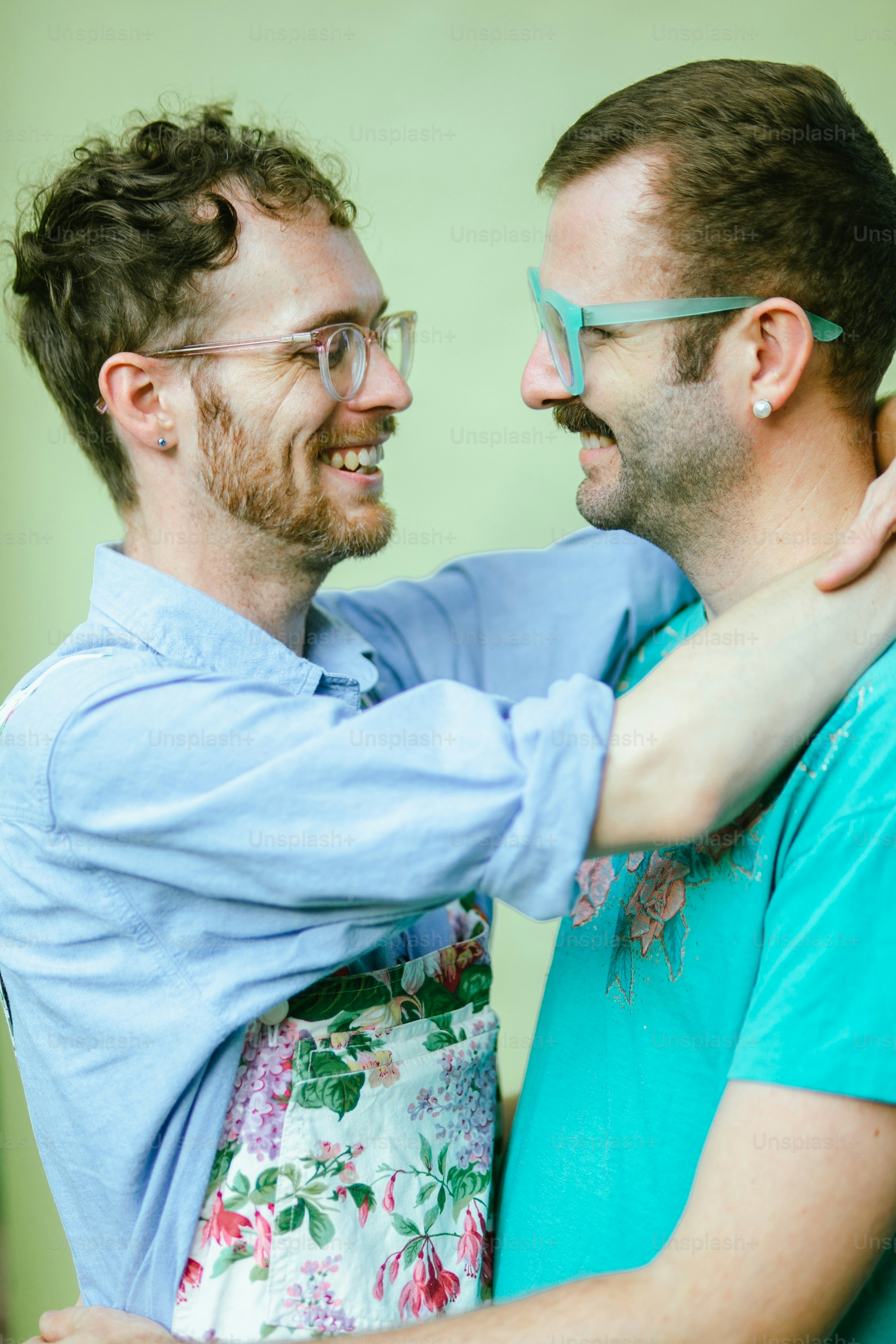 a couple of men standing next to each other