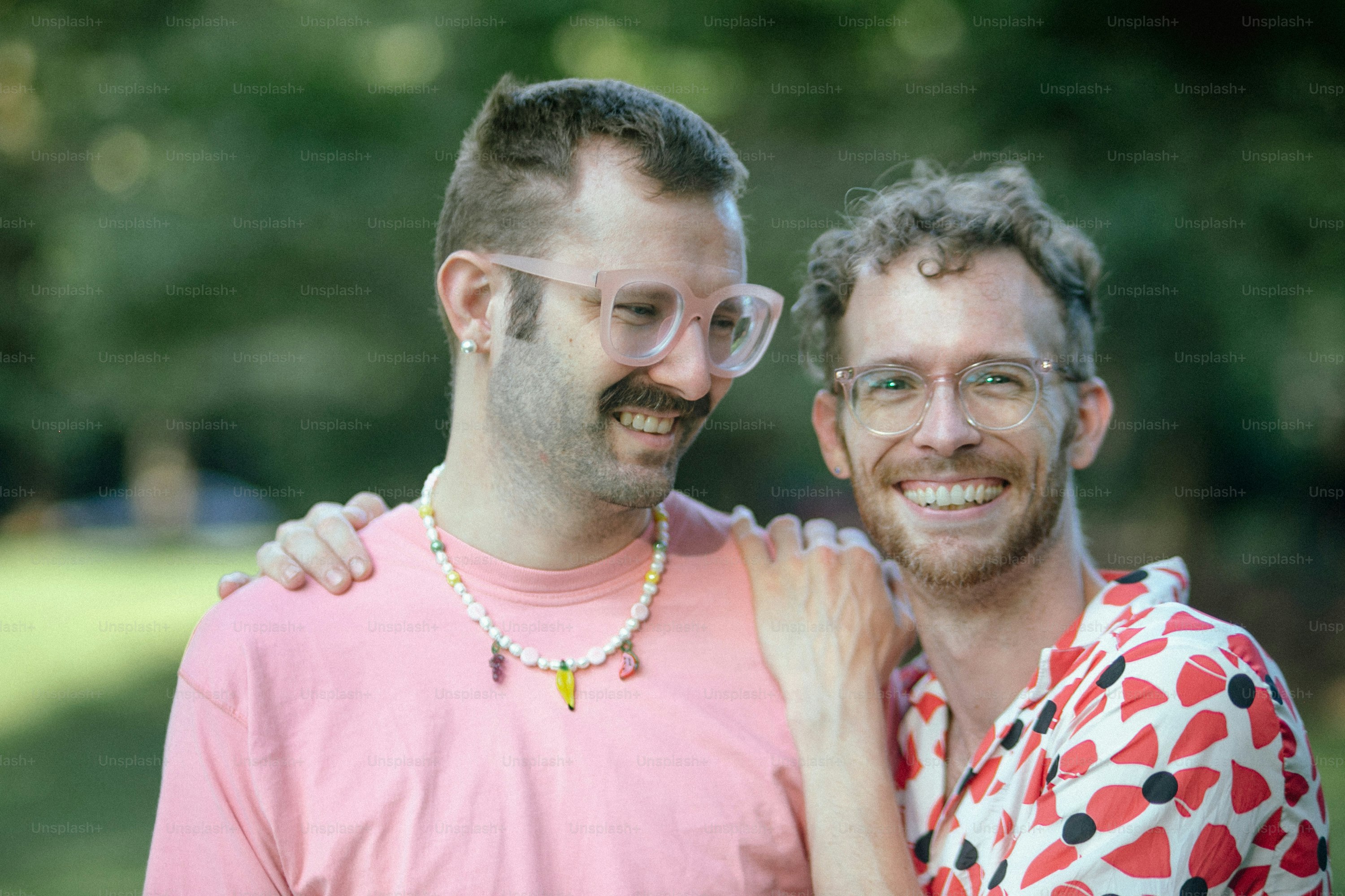 a couple of men standing next to each other