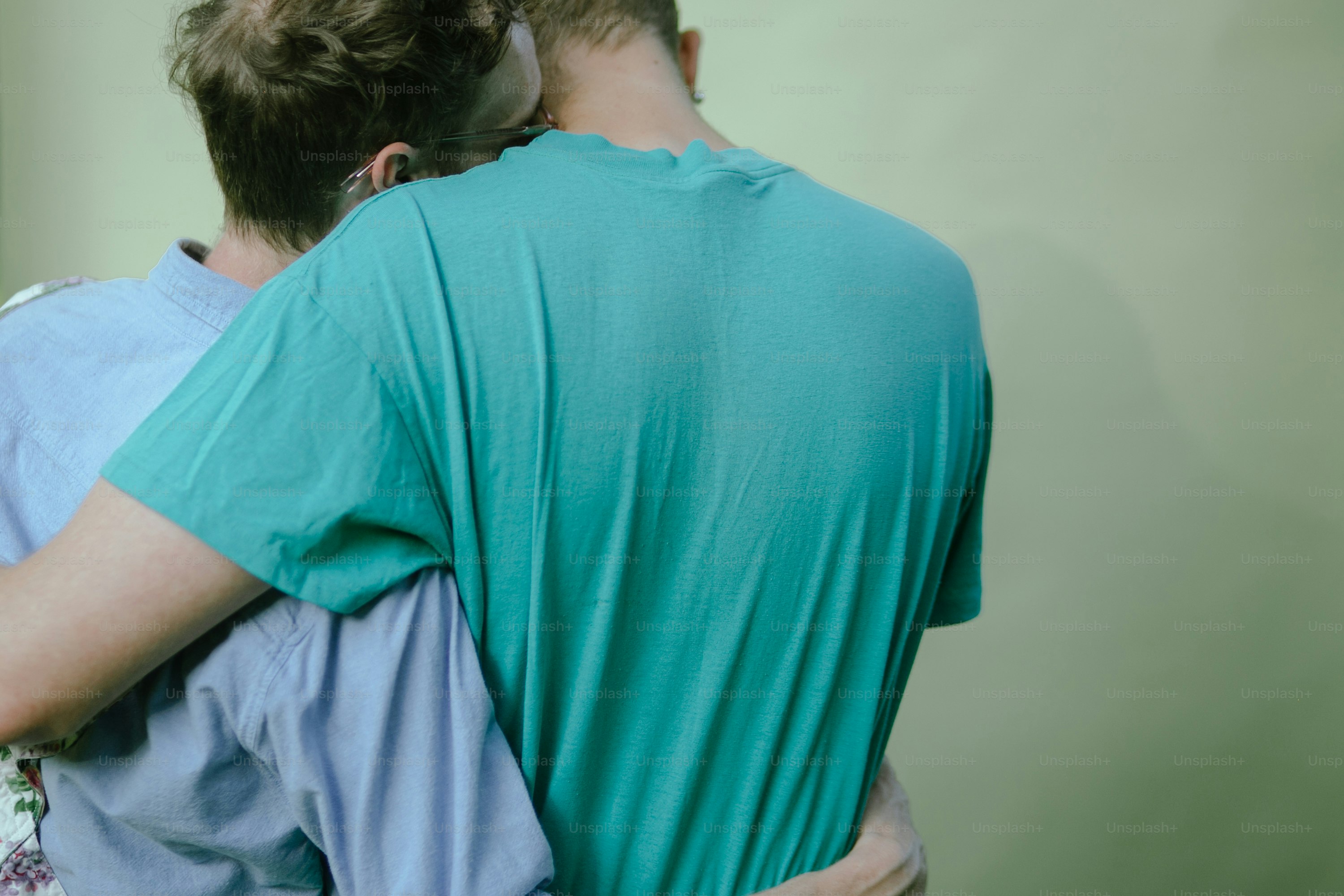 a man and a woman embracing each other