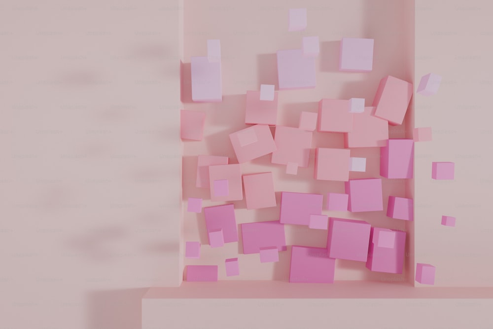 たくさんの正方形が描かれたピンクの壁