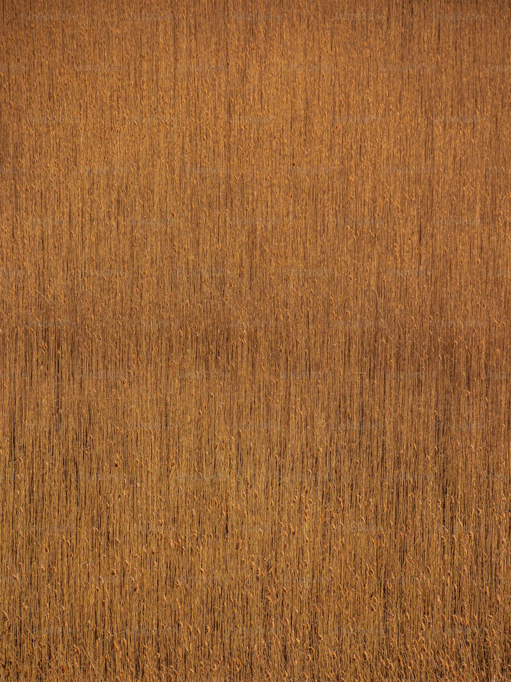 una superficie de madera con un color marrón