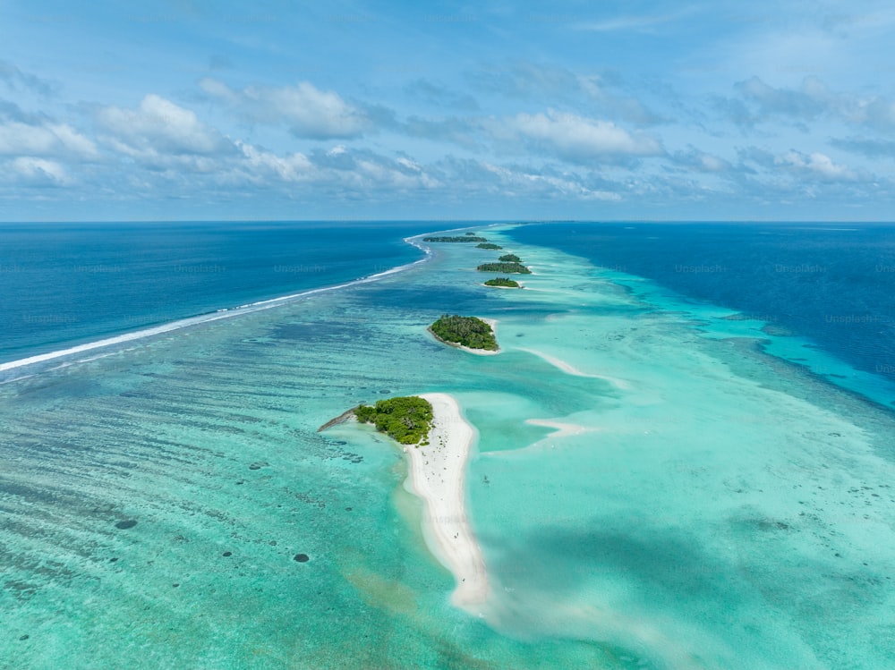 an aerial view of an island in the middle of the ocean