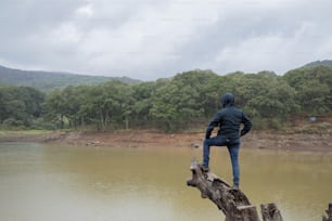 man watching a dried lagoon due to global warming in Mexico