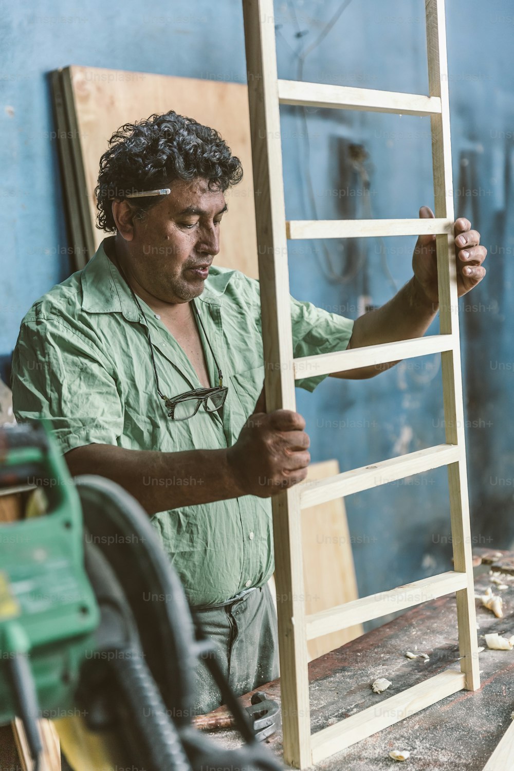 Mexican carpenter working in his workshop