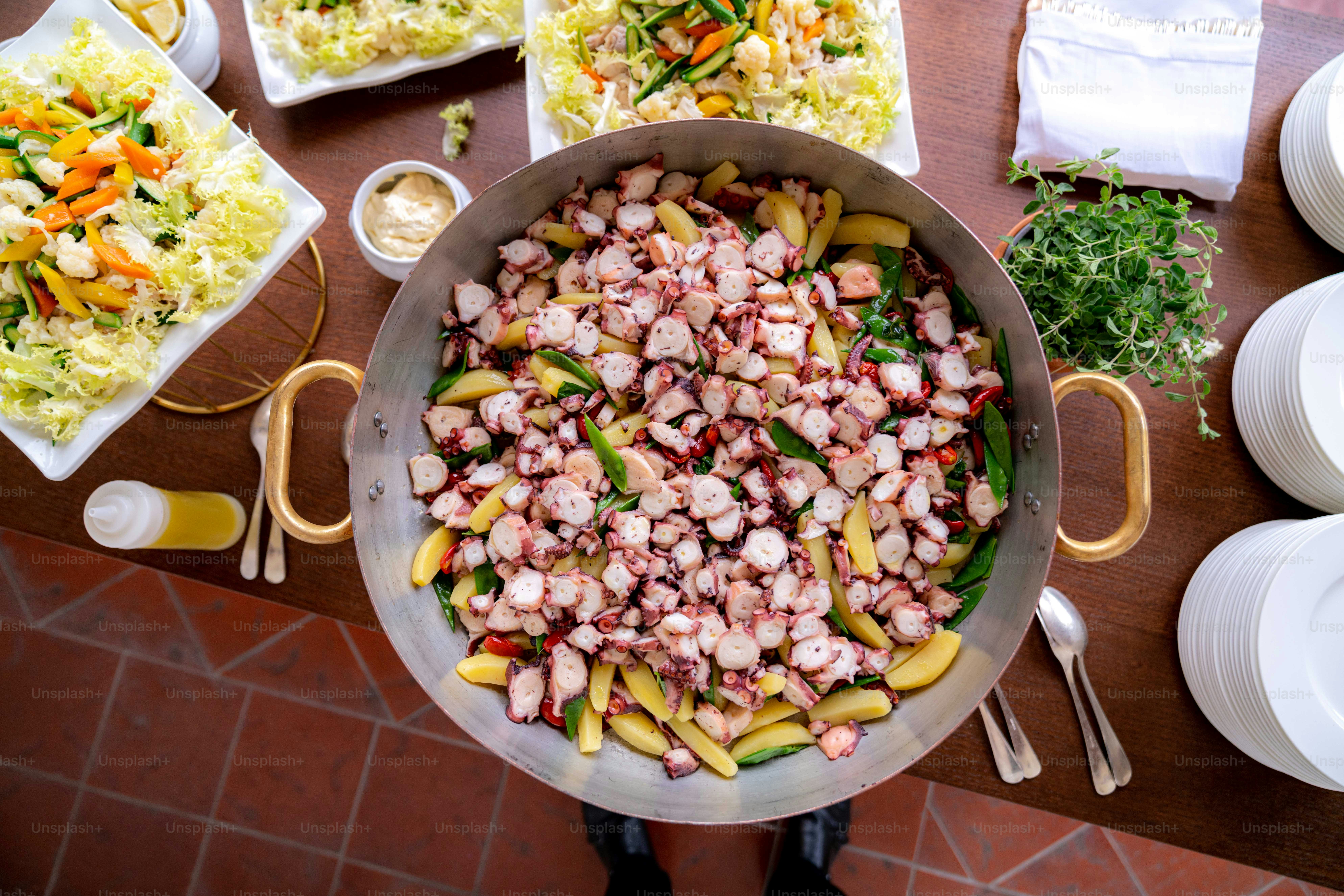 a large pan filled with food on top of a table