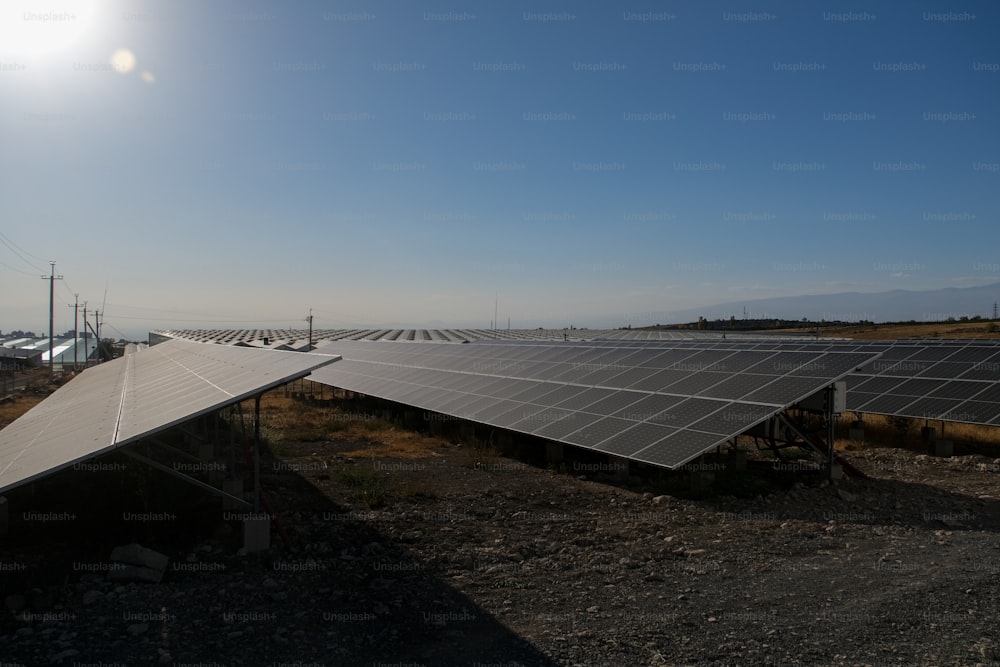 a large solar array in the middle of a field