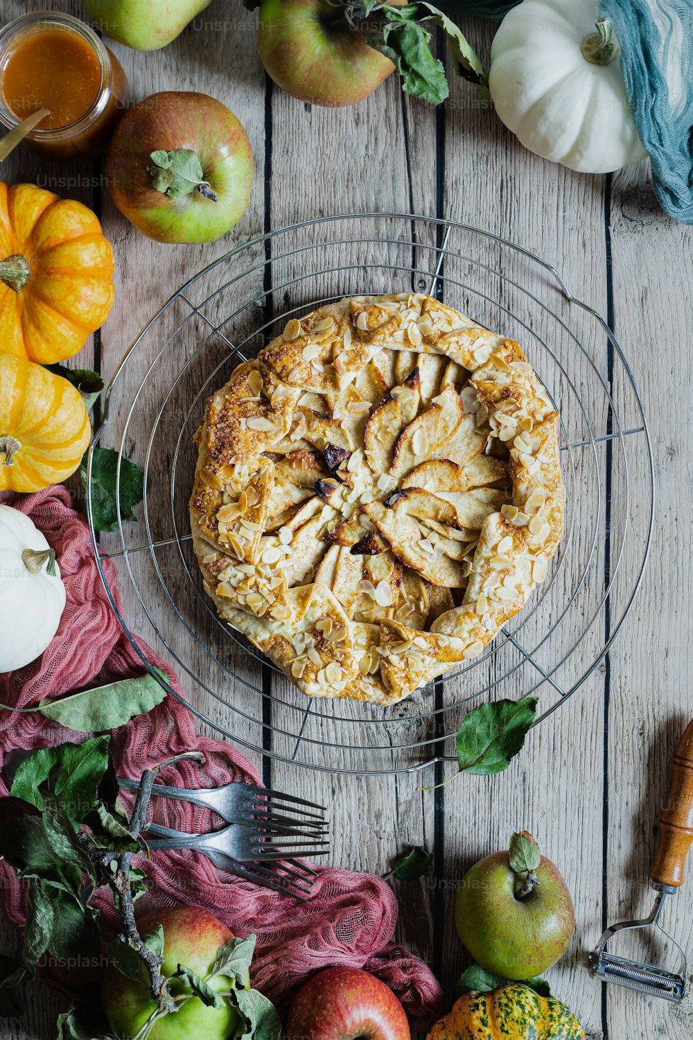 a pie sitting on top of a metal rack