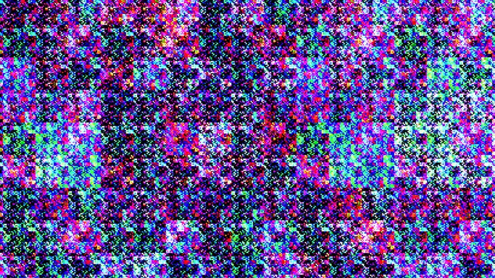 a very colorful tv screen with a lot of dots on it