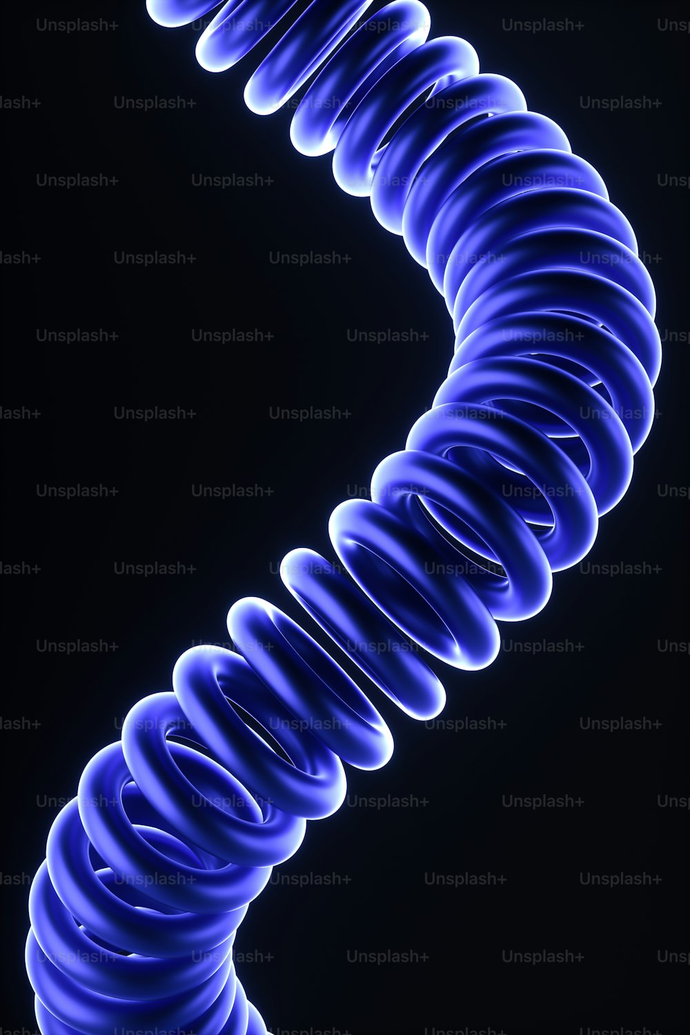 a spiral of blue light on a black background