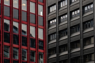 a red and black building and a black and white building