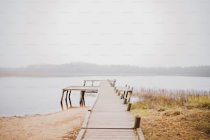 a wooden dock sitting next to a body of water