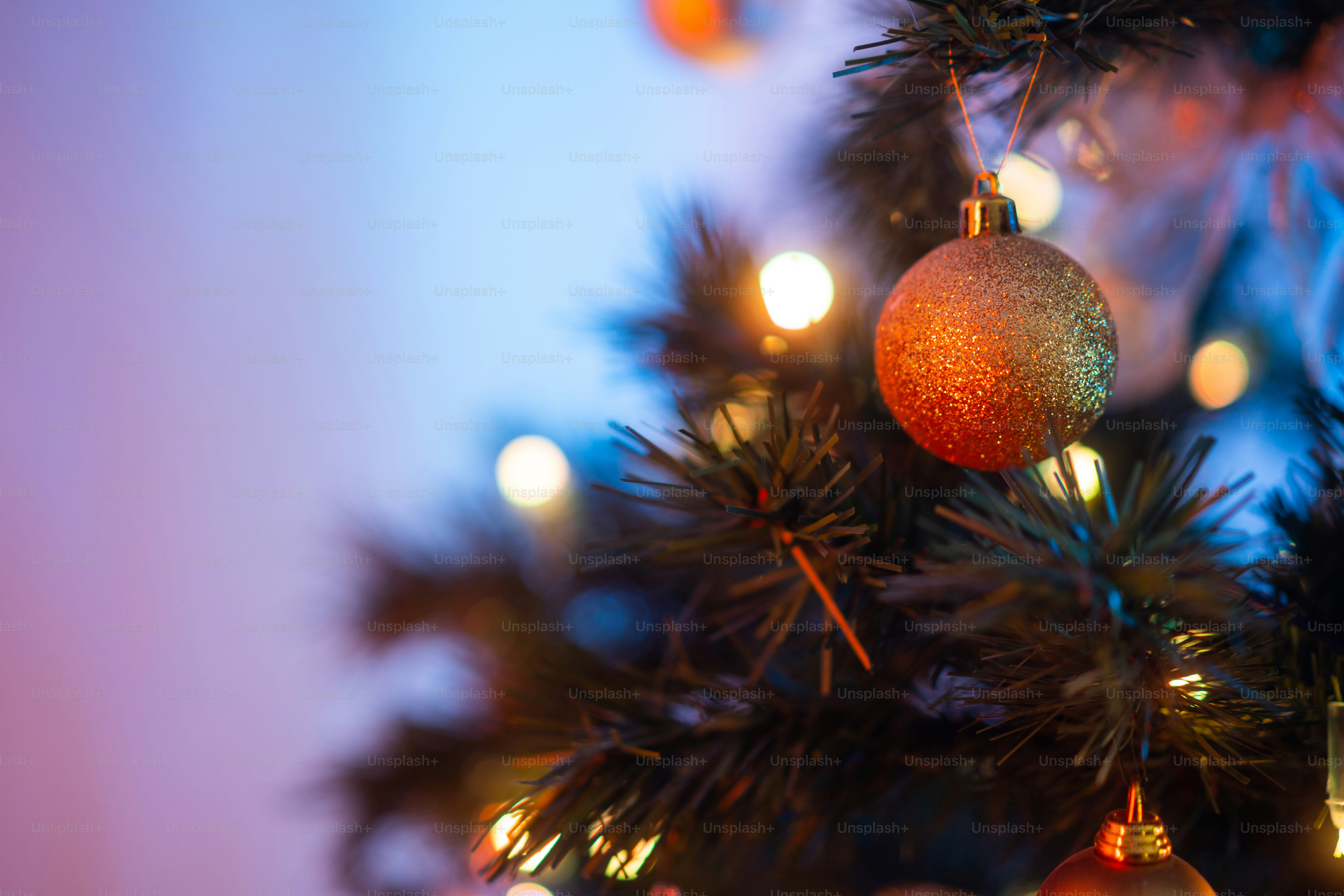 a close up of a christmas tree with lights