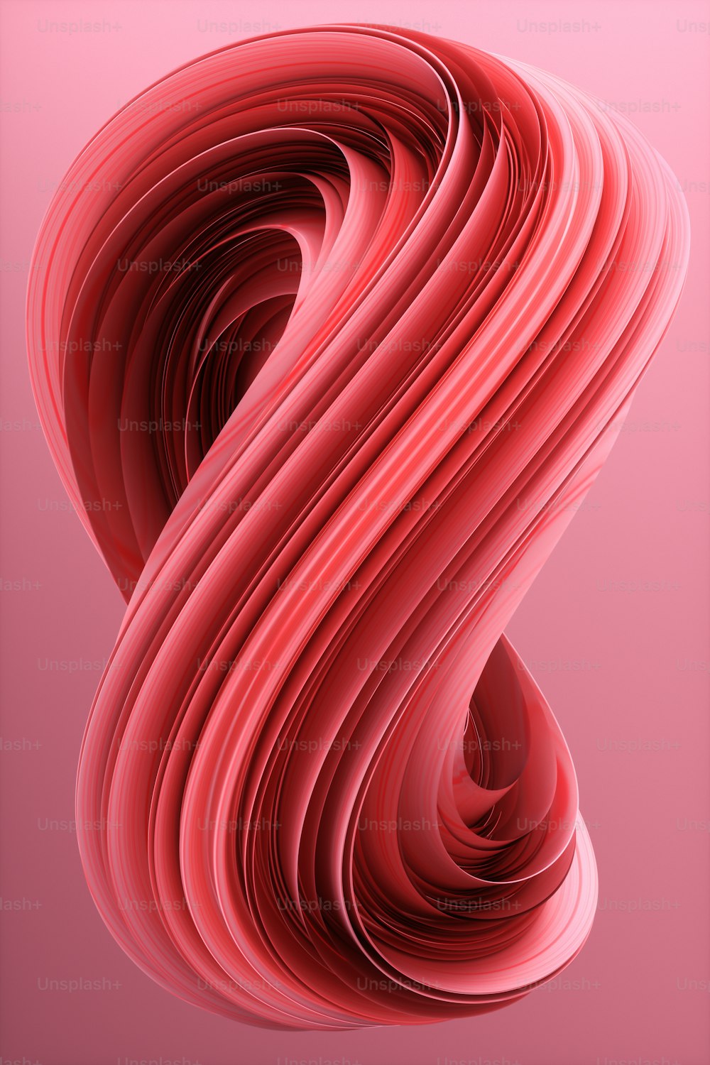 a pink abstract background with a curved design