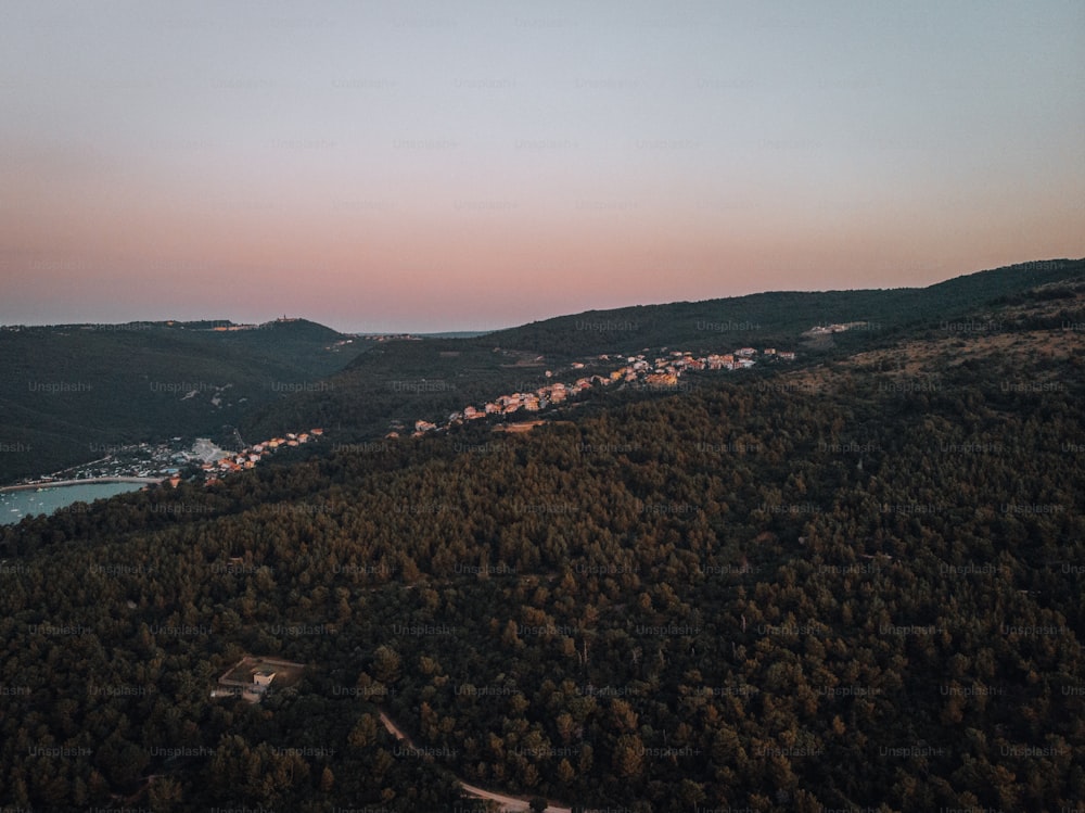 a bird's eye view of a small town on a hill