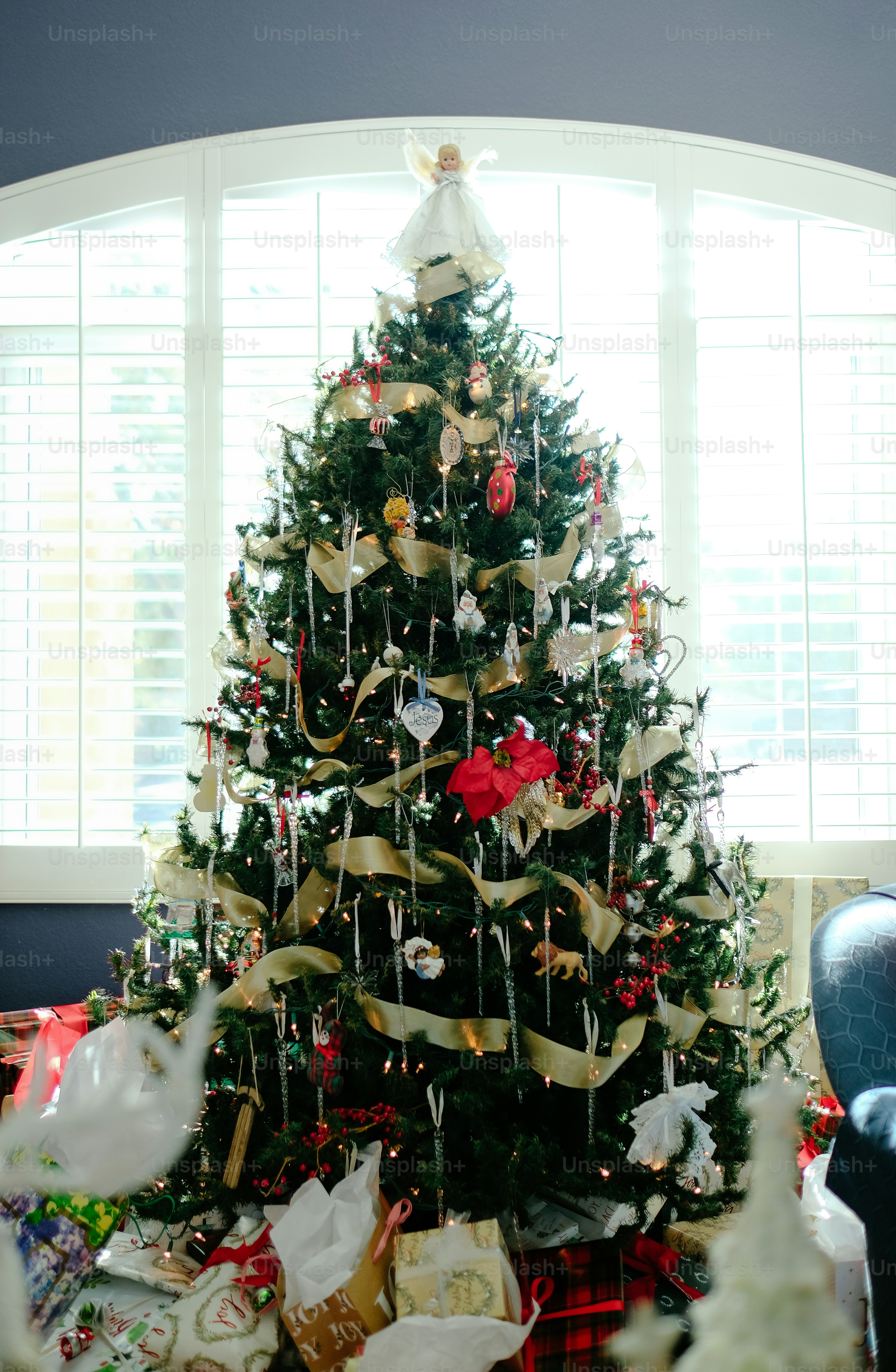 a decorated christmas tree in a living room