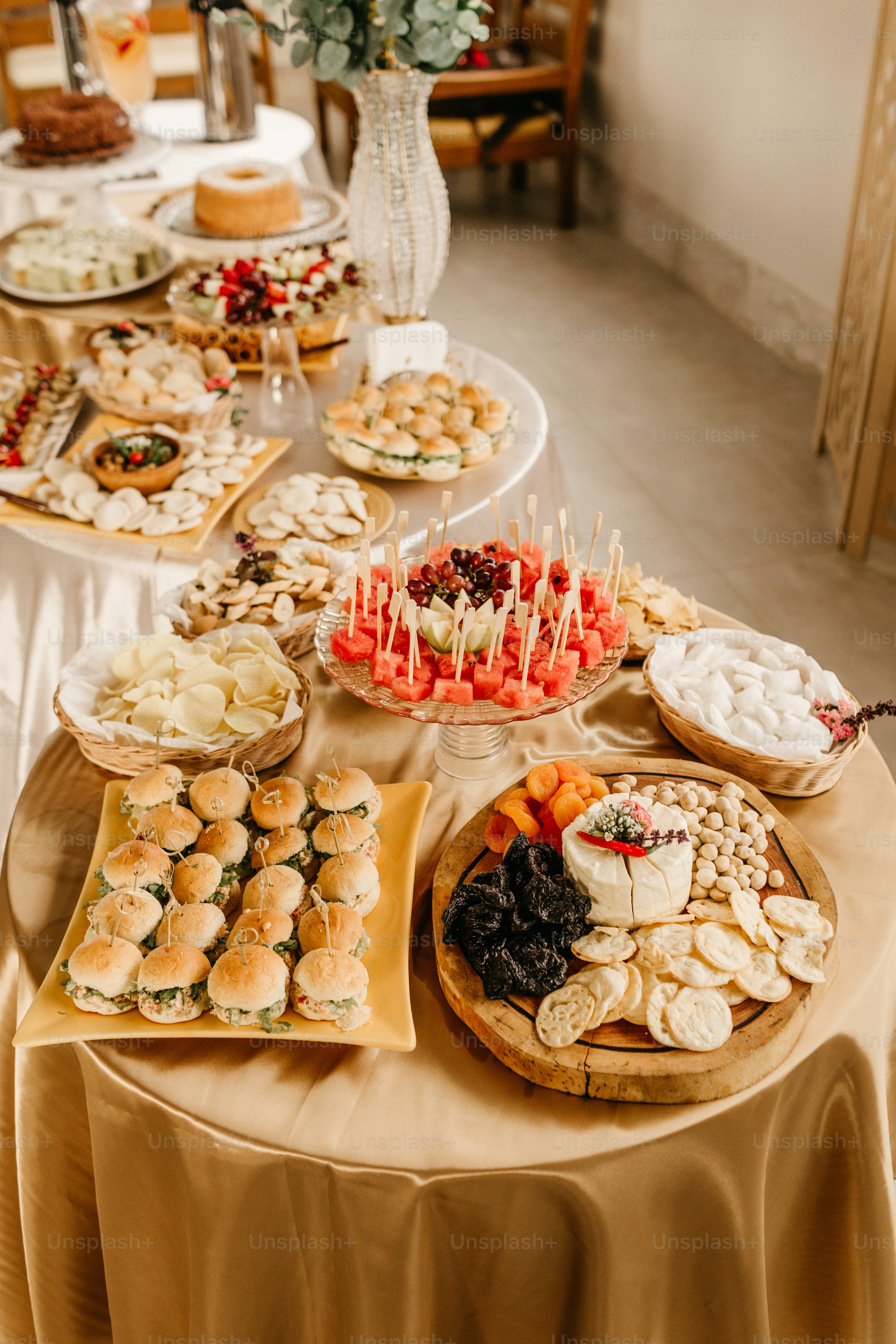 a table topped with lots of food on top of a table