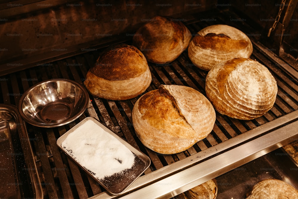 a bunch of breads that are on a grill