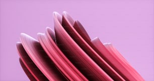 a close up of a pink object on a purple background