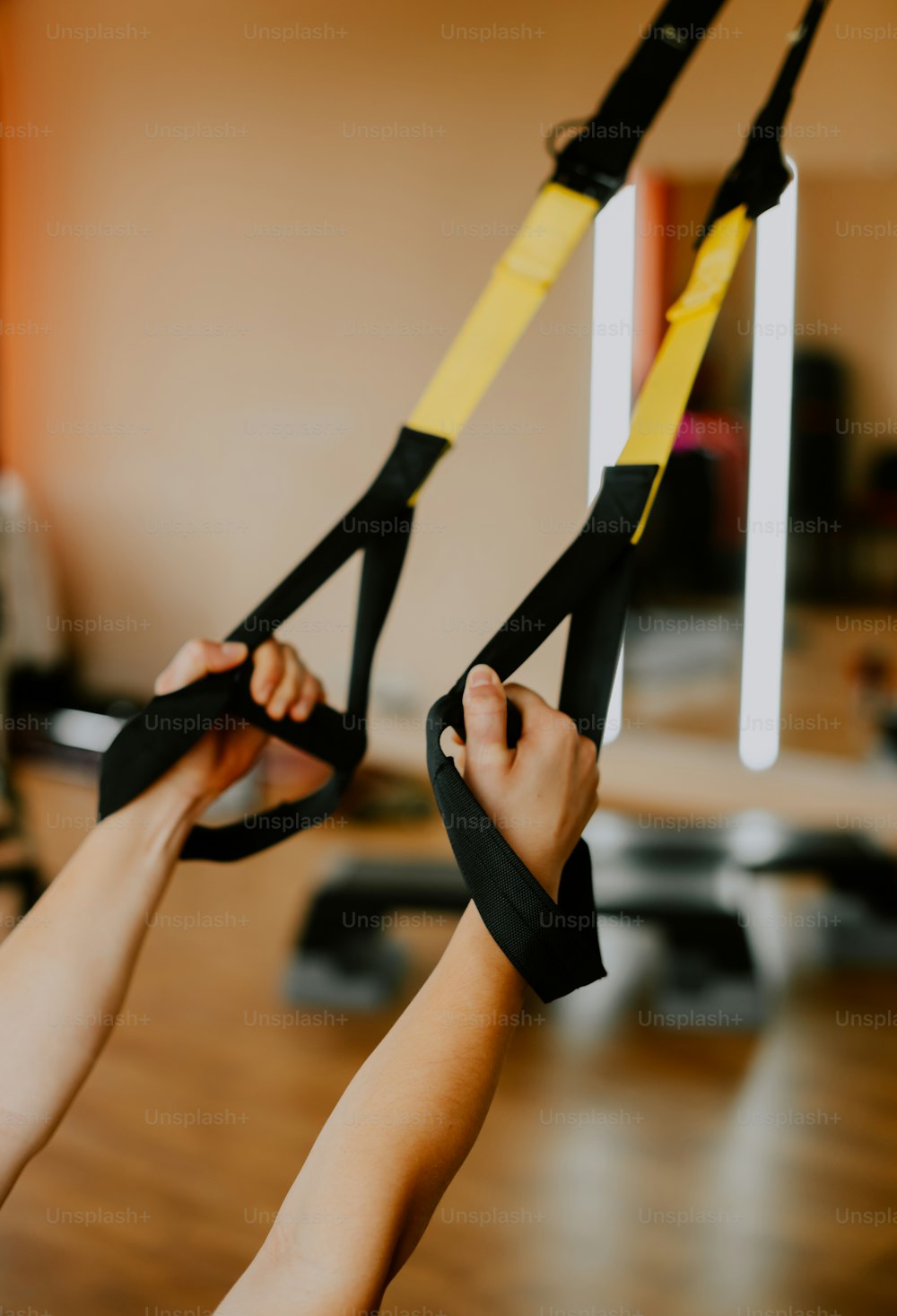 Trx Training Young Athletic Woman In Sports Clothing Training Legs With Trx  Fitness Straps In The Gym Stock Photo - Download Image Now - iStock