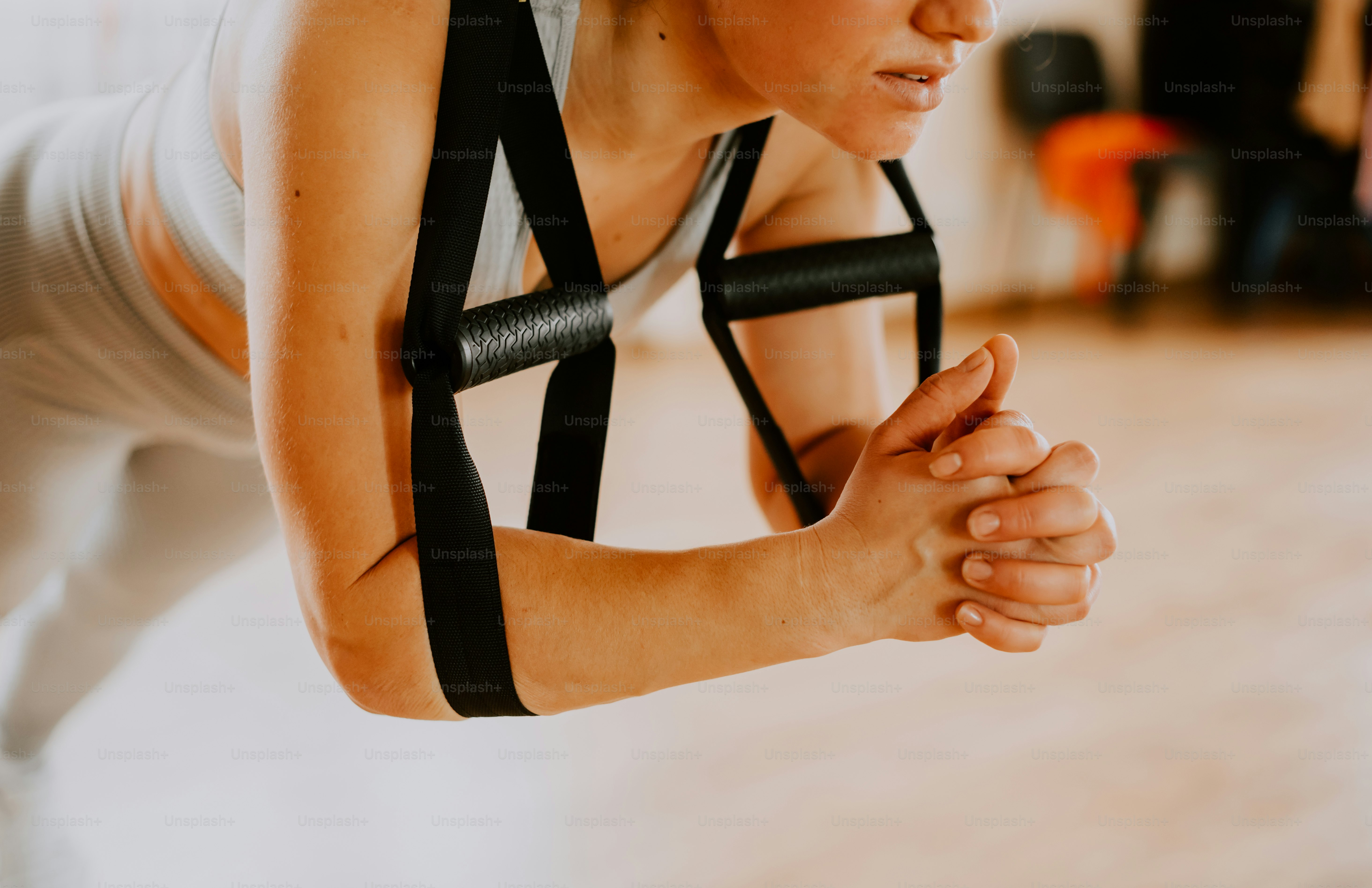 a woman is doing a push up exercise