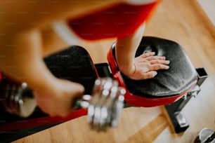 a close up of a person riding a stationary bike