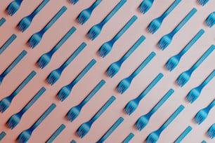 a pattern of blue toothbrushes on a pink background