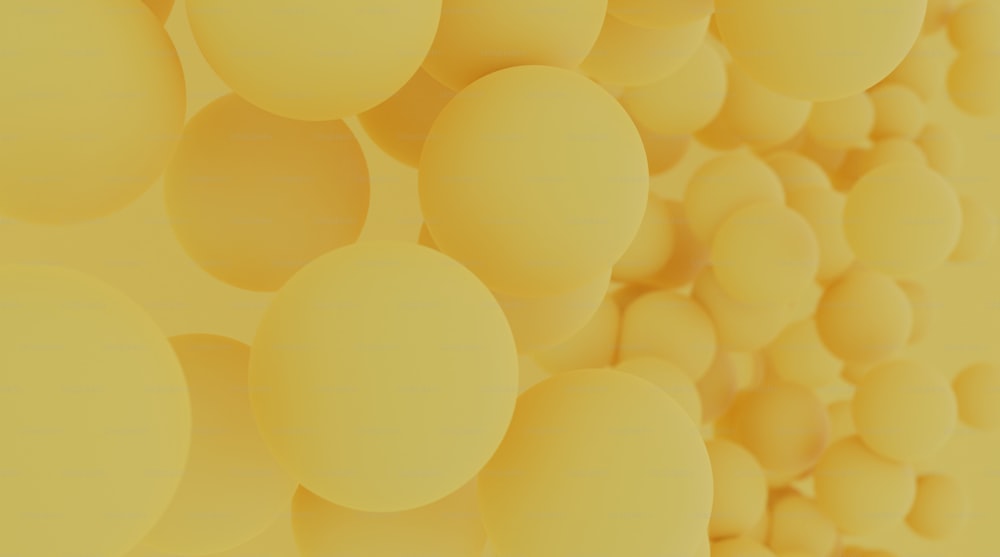 a bunch of yellow balls that are in the air