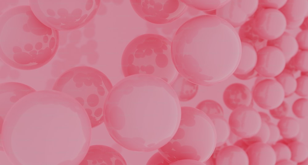 Un fondo rosa con muchos globos flotando en el aire