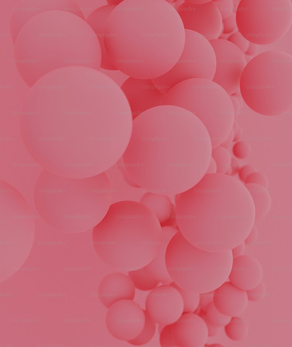 a pink background with lots of bubbles on it