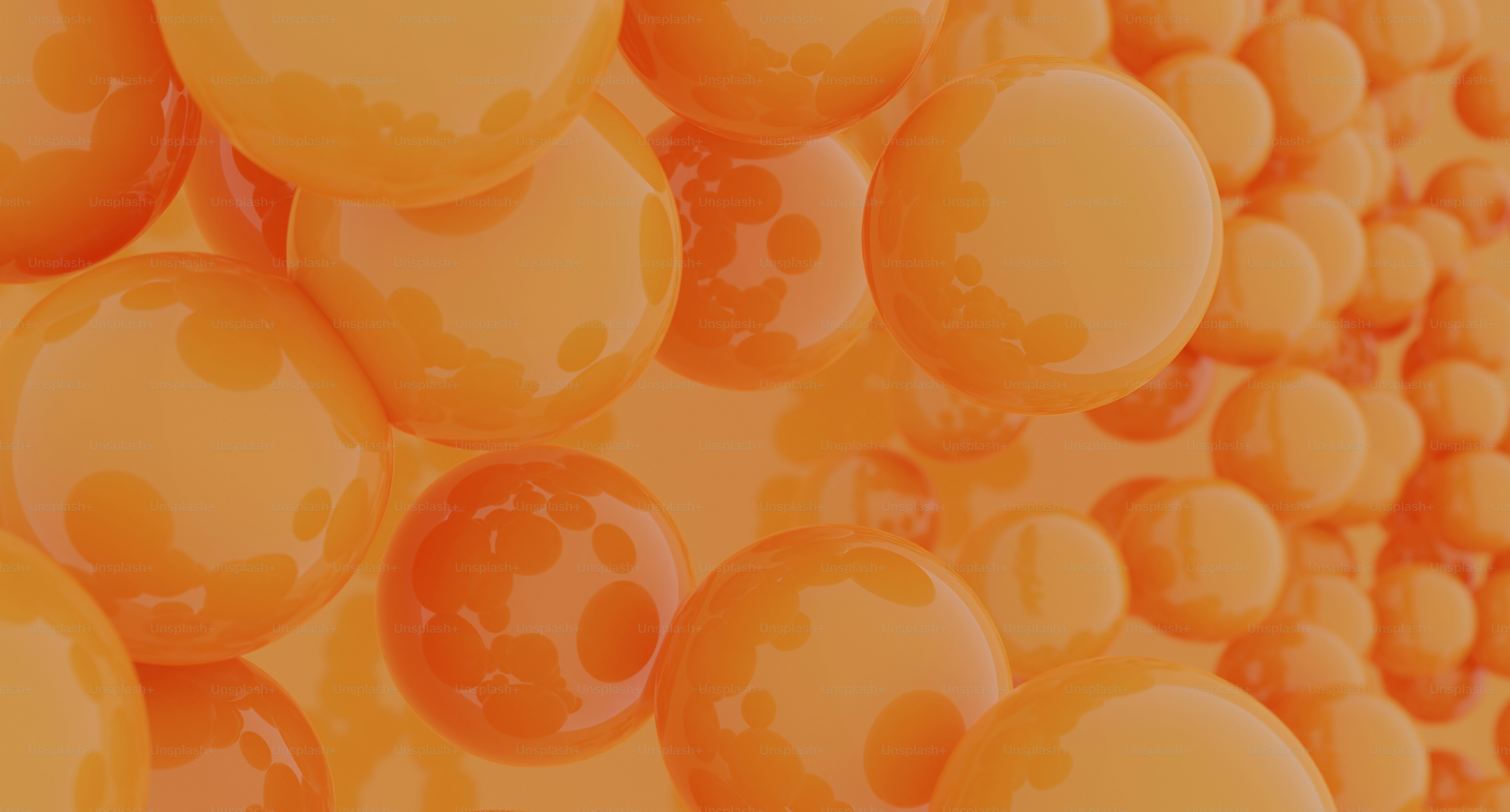 a group of orange balls floating on top of each other