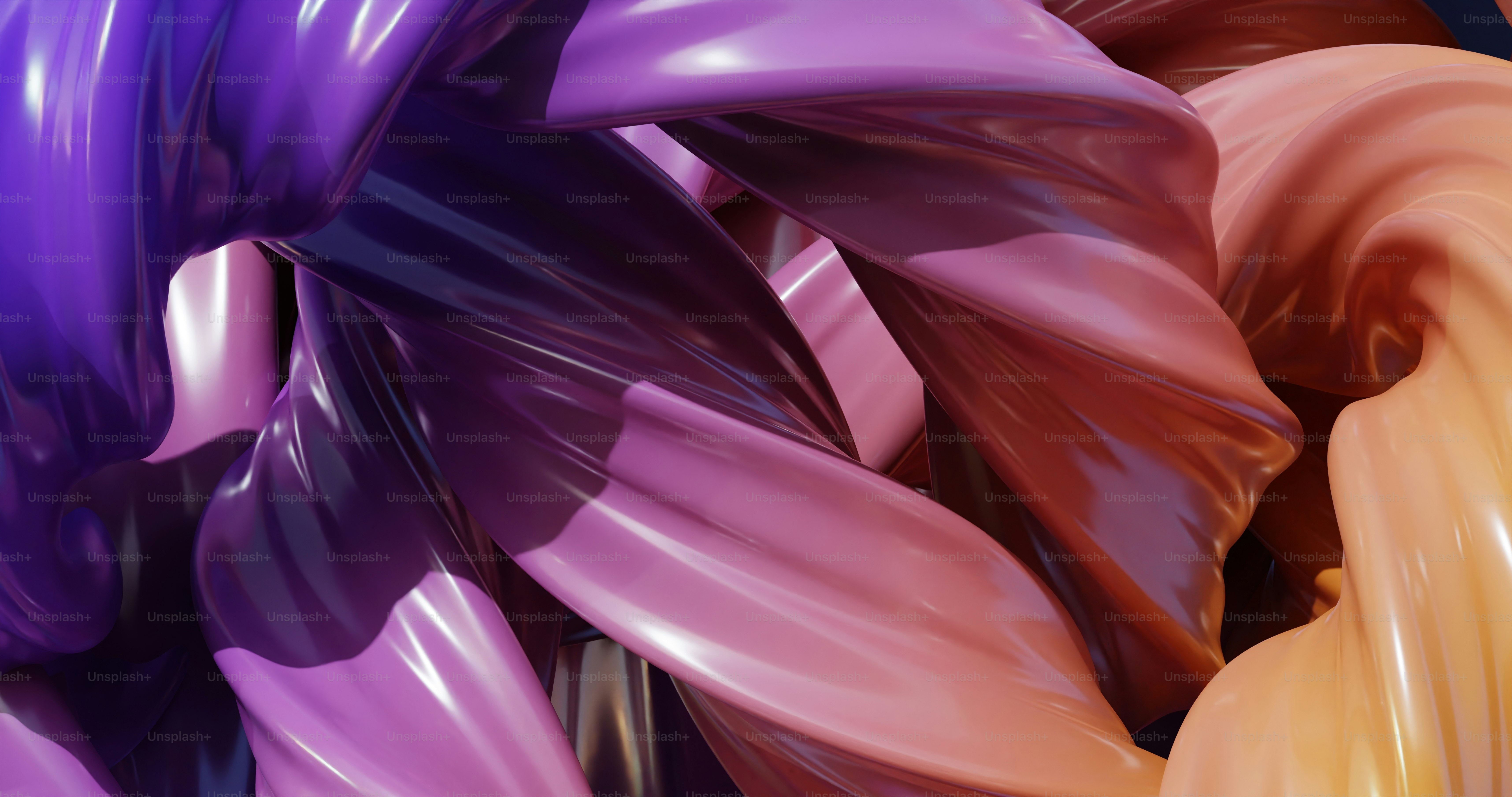 a close up of a bunch of different colored balloons