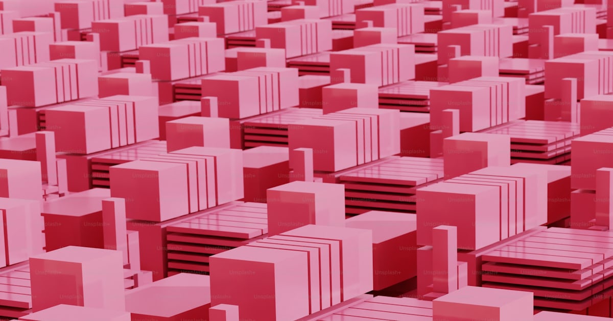 A large group of pink cubes in the middle of a room photo – Background ...