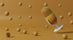 a yellow microphone is surrounded by small balls