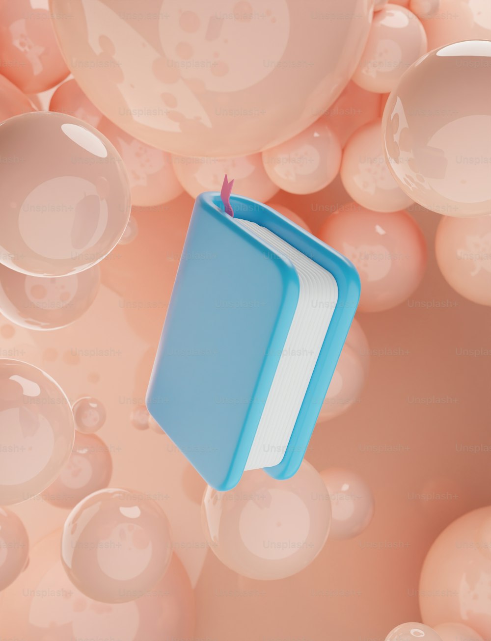 a book floating in the air surrounded by bubbles