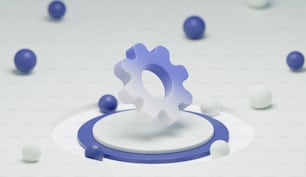 a blue and white object is surrounded by balls
