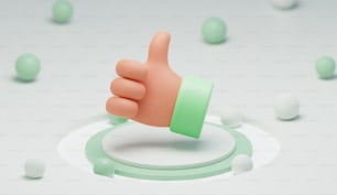 a hand with a thumb up on a white surface