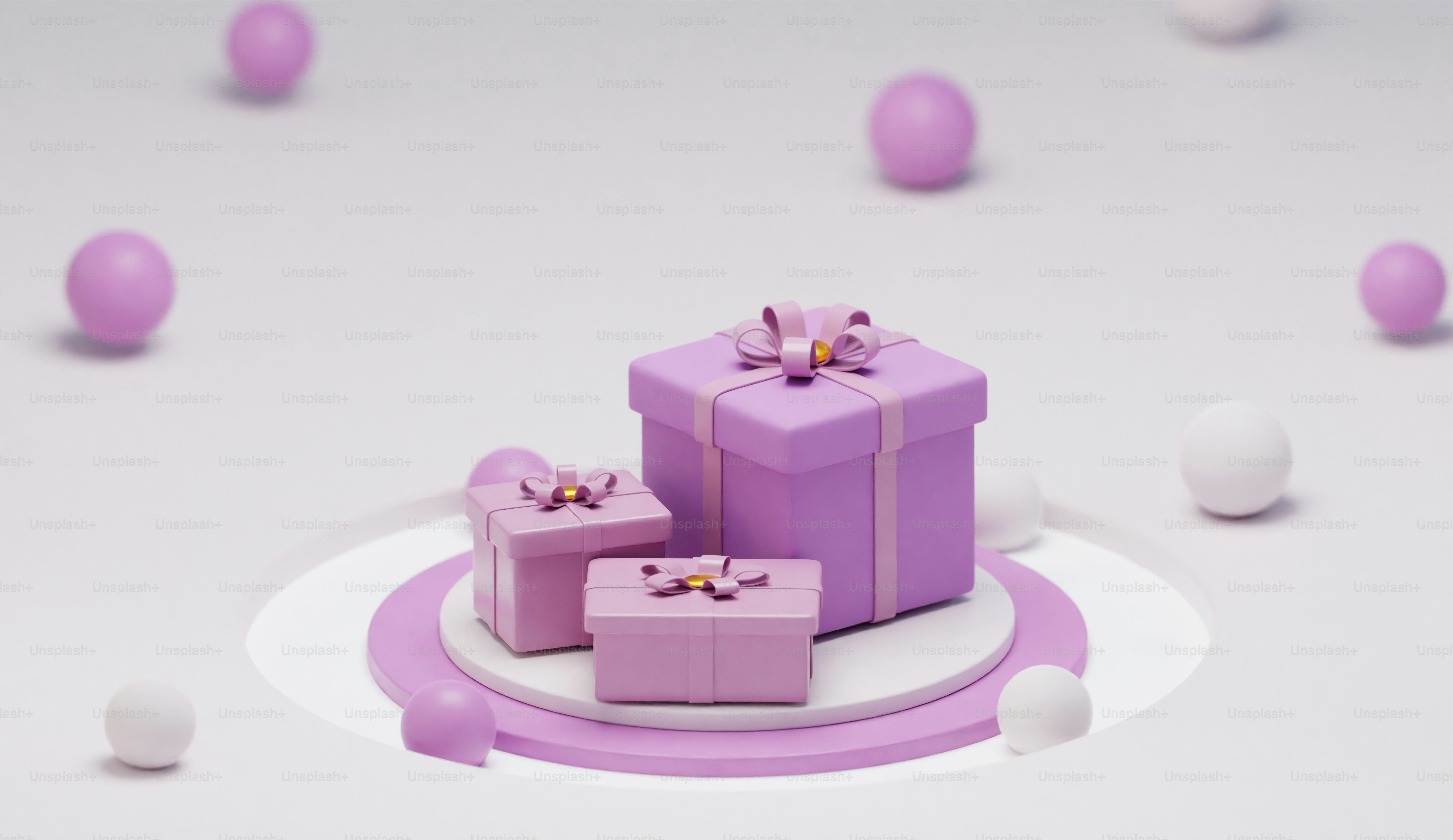 A group of purple presents sitting on top of a table photo – Gift boxes ...