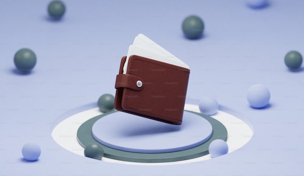 테이블 위에 놓인 작은 갈색 지갑