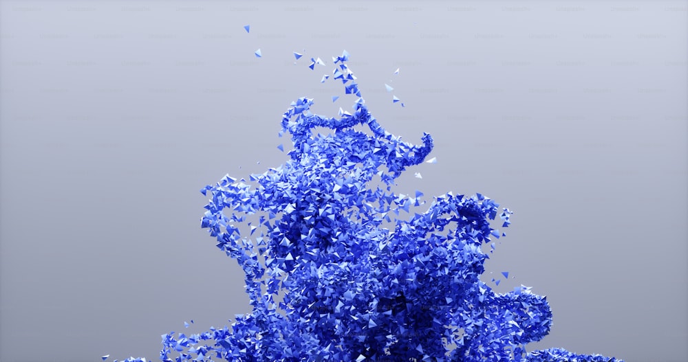 um monte de confetes azuis borrifa no ar