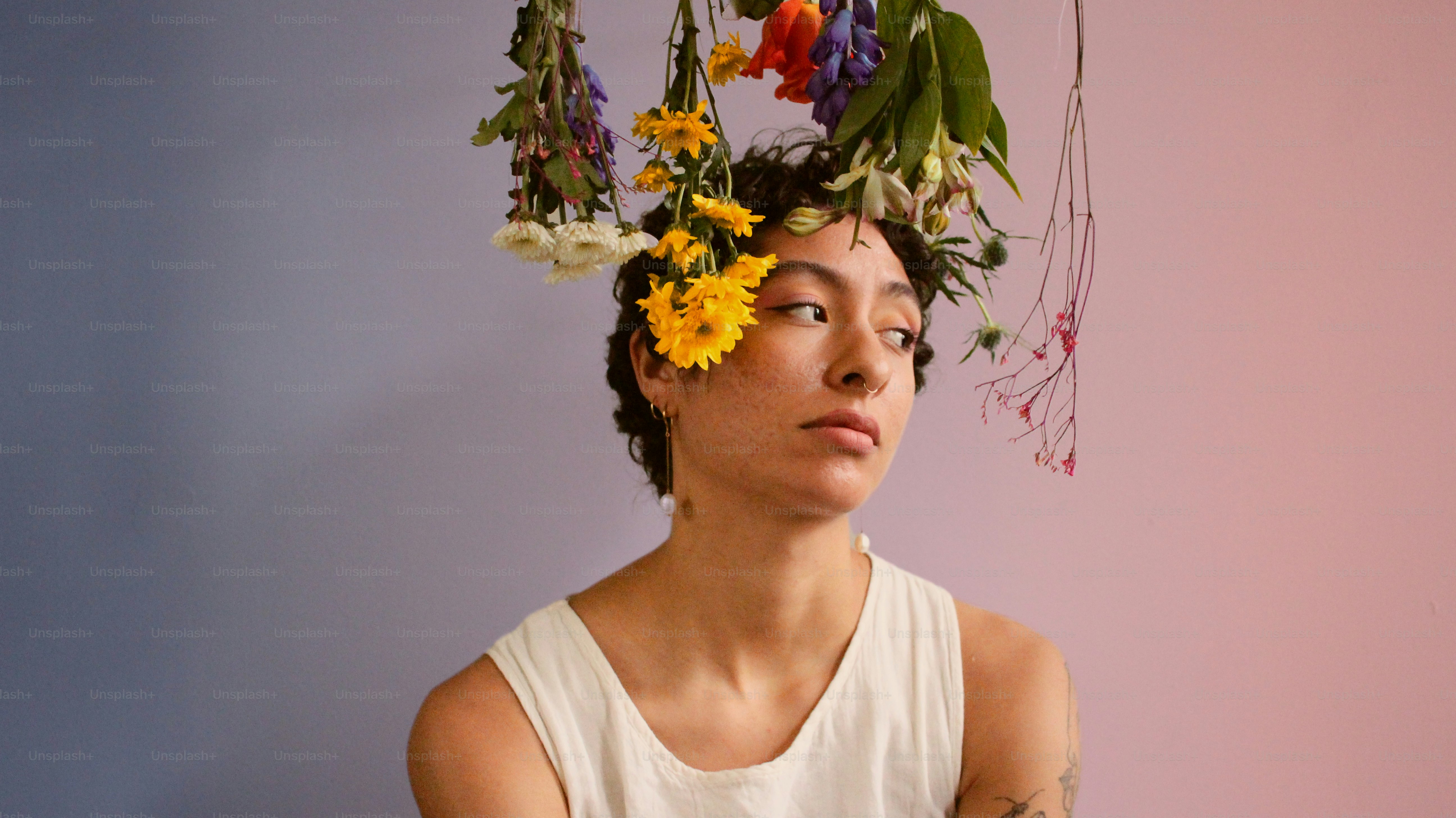 a woman with a flower crown on her head