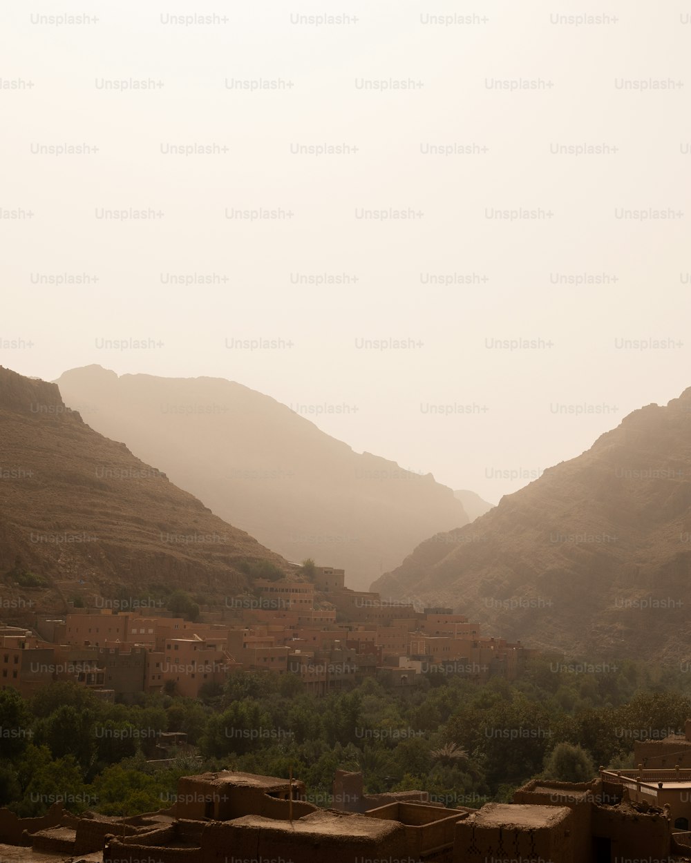 a village in the middle of a mountain range