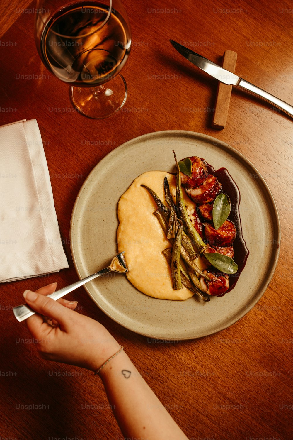 a plate of food on a wooden table