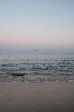 a view of a body of water from a beach