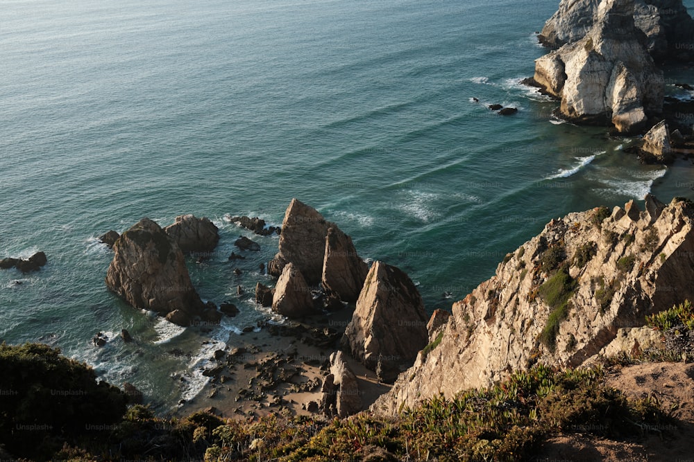 a large body of water surrounded by rocks