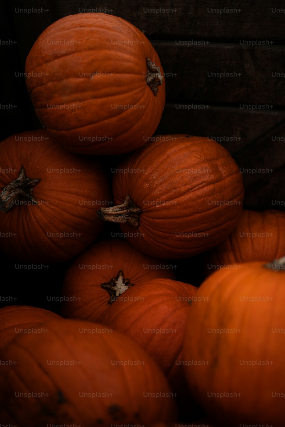 a pile of pumpkins sitting on top of each other